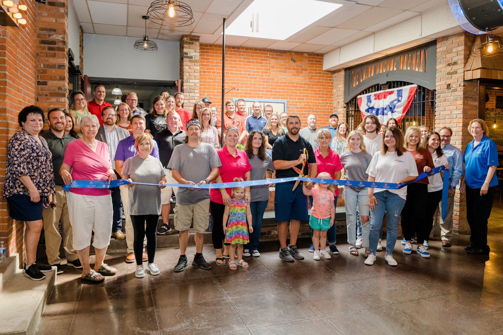 Magnificent Maid Cuts Ribbon on New Downtown Tiffin Office