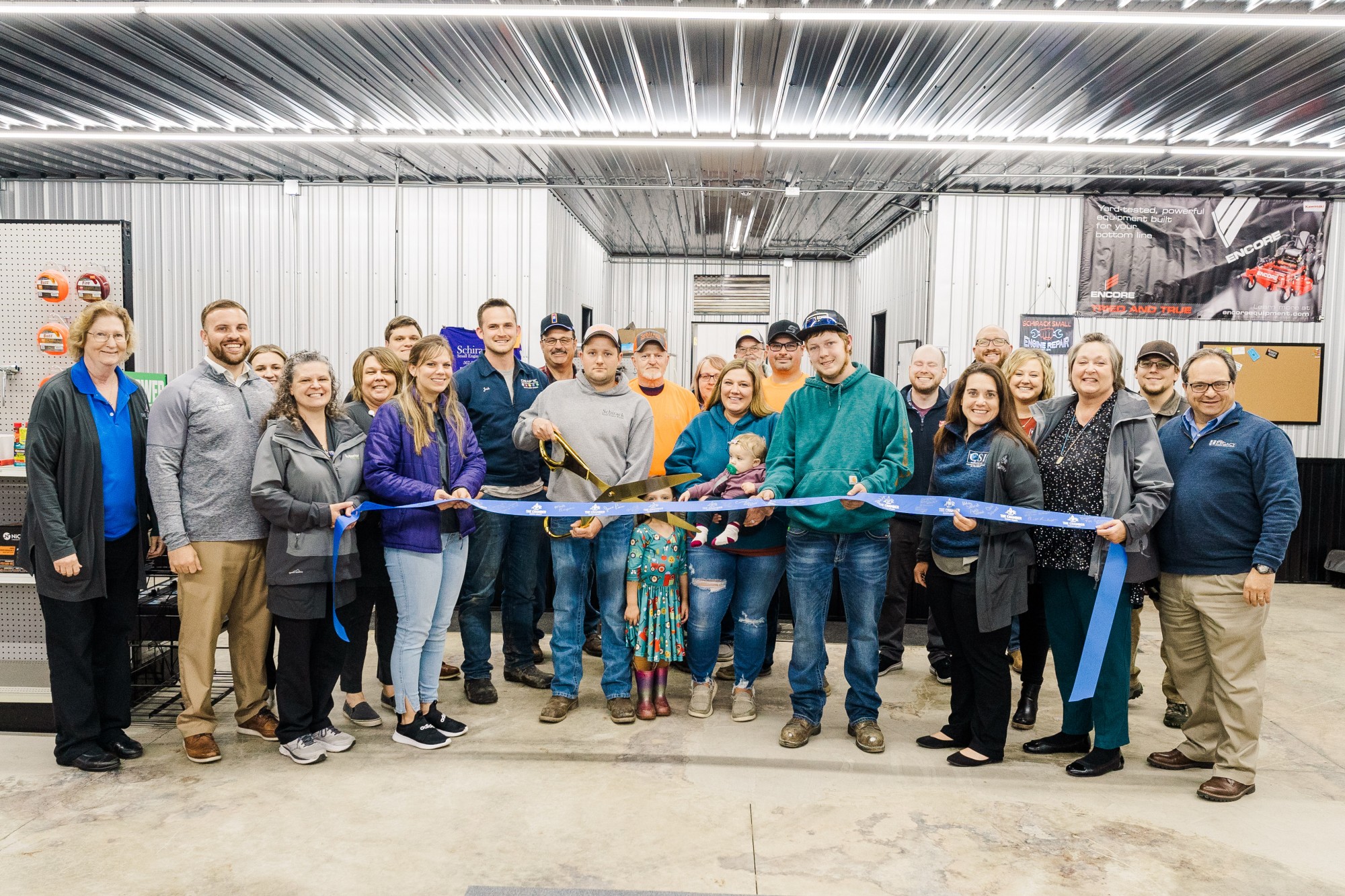 Schirack Small Engine Repair Cuts Ribbon on New Building